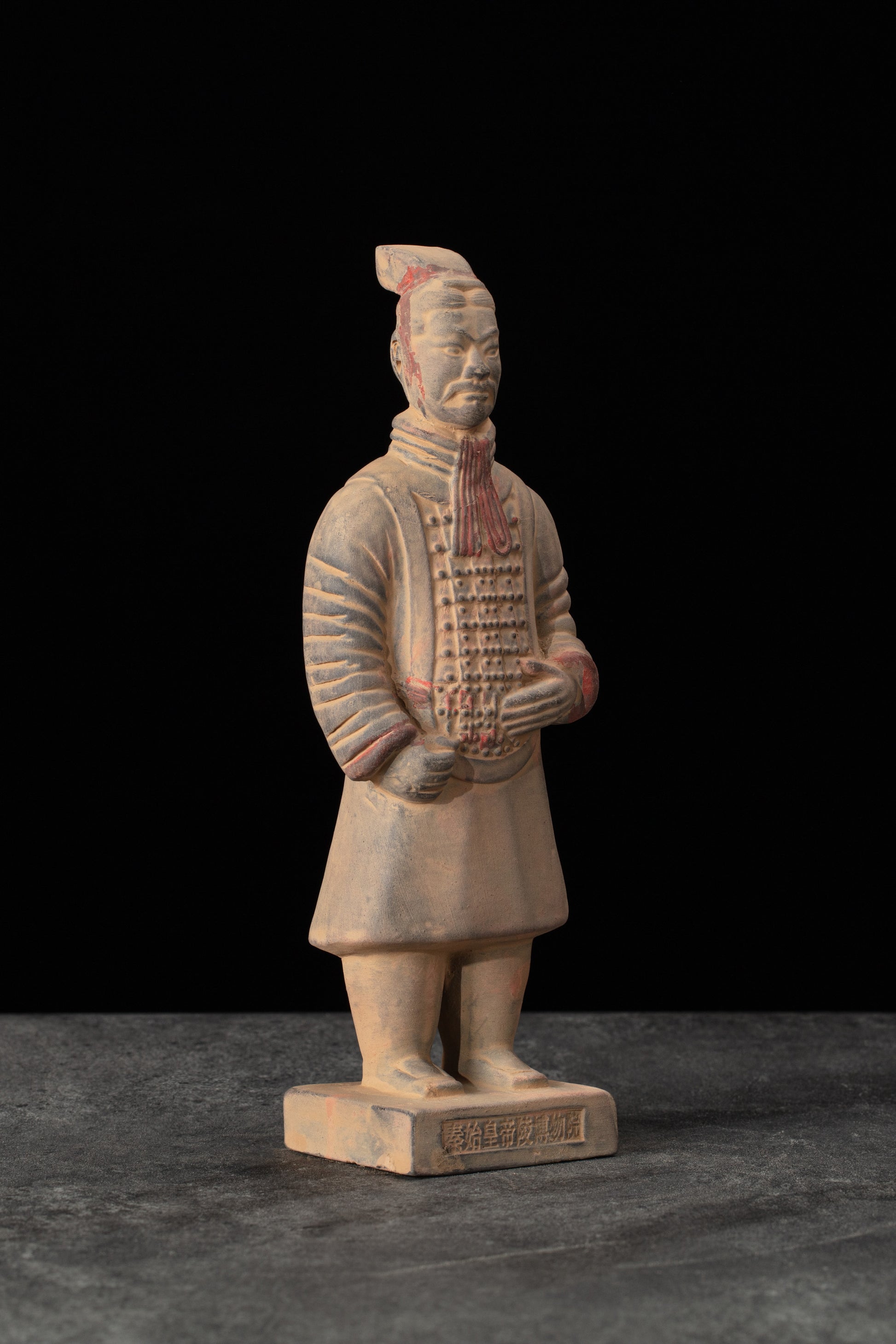 20CM Painted Officier - CLAYARMY-Side profile capturing the vibrant colors and intricate patterns of the 20CM Painted Officer's attire.