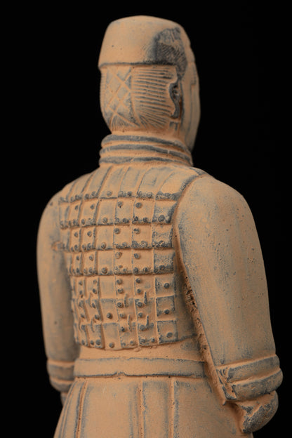 15CM Cavalryman - CLAYARMY-Close-up of the 15CM Terracotta Army Cavalryman's face, revealing intricate armor details and a distinct flat bun hairstyle.